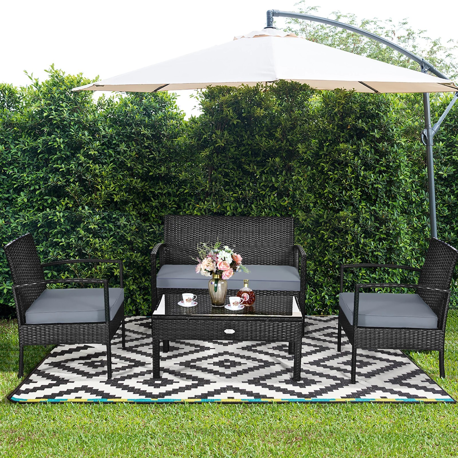 Costway 4-Piece Outdoor Rattan Furniture Set: Stylish Comfort for Your Patio